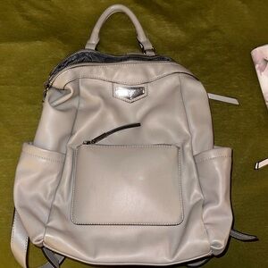 Grey backpack and matching wallet